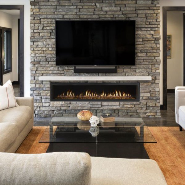 55 TV Mounted on Stone Fireplace